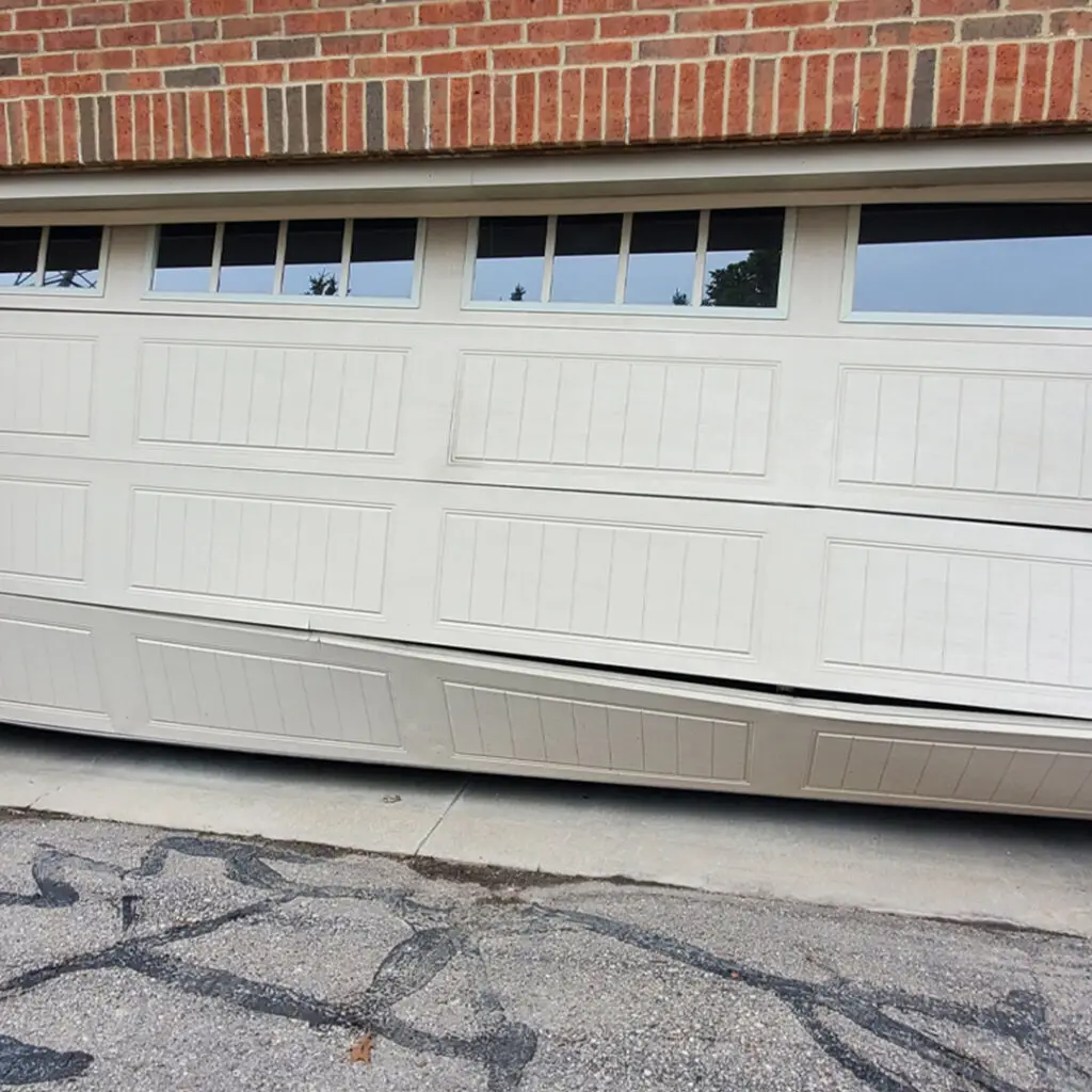 damaged home garage door panel repair